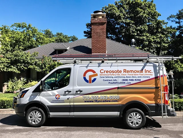 Largo Chimney Sweep technician removing creosote safely in Largo, FL