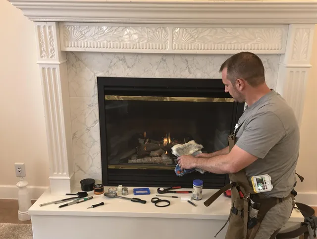 Largo Chimney Sweep performing fireplace maintenance in Largo, FL