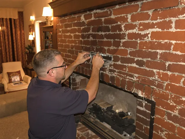 Largo Chimney Sweep expert fixing a fireplace in Largo, FL